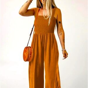 Vacation ready ruched cami top, wide-legged jumpsuit w/pockets. Light & cool.